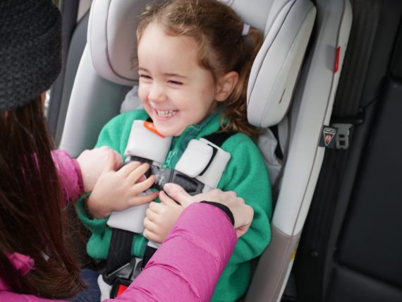 Tickle test demonstration in forward facing car seat